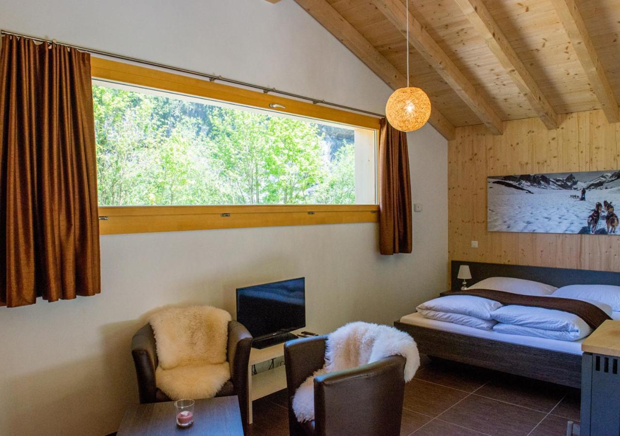Huettenhotel Husky Lodge Muotathal ภายนอก รูปภาพ
